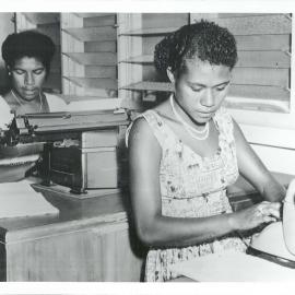 The Bank at Work - Branches - Port Moresby, Papua New Guinea -The first Papuan typists, Miss E Currie and Miss A Busina - 1963