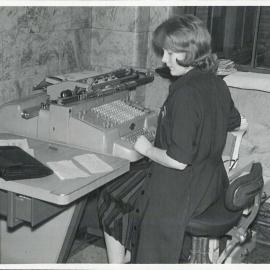 London - Staff at work - Ledger posting machine operator, 1962