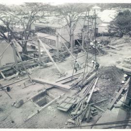 Port Moresby Project - October 1966-October 1970 - View of rear yard area.  Sewerage man-hole No. 5 in centre of foreground, 28 September 1967