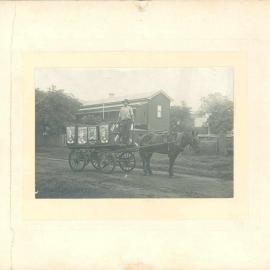 Loan advertising World War I - Commercial traveller's cart with posters attached, 6th War Loan