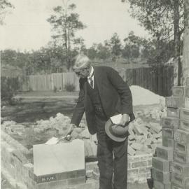 War Service Homes Scheme, NSW - Mr Denison S.K. Miller laying the foundation stone of the first War service home in Kennedy St , Canterbury - 21 July 1919