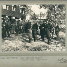 War Service Homes Scheme, Qld - Capping the first stump of the Brisbane home - 21 August 1919 (copy a)