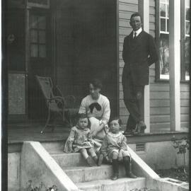 Commonwealth Bank - Individual Officers - Mr OA Smith - Taken on porch, includes his wife and two children - 1 October 1913 (plate 102)