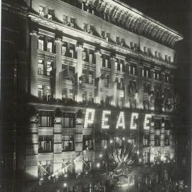 Commonwealth Bank - Head Office cnr Pitt Street & Martin Place - Peace Celebrations - decorated by night - 19 July 1919 (plate 187)