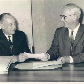 Premises - Head Office - Cnr Pitt Street & Martin Place - Transfer of Title to the Commonwealth Bank -  EB Richardson (left) and JG Phillips signing contract - 18 January 1965