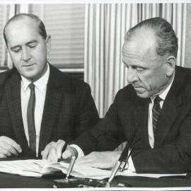 Coombs, HC with Mr WM Leavey, Managing Director of Civil and Civic, signing contract for Stage 2 of Melbourne Branch - January 1964