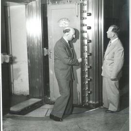 Coombs, HC looks over Commonwealth Bank vaults (view ii) - March 1951