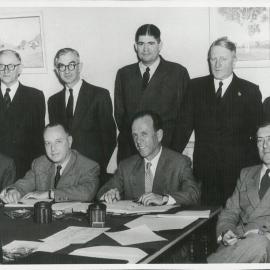 Commonwealth Bank Board - Group - Meeting held in Adelaide - L to R Standing: Hytten, Osborne, Gunn, Sanderson, Symons. Seated: Grimwade, Richardson (Deputy Governor); Dr Coombs and Wilson - December 1954