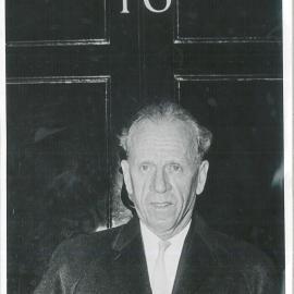 Bank's Functions, etc - Overseas Travel - Dr Coombs leaving No. 10 Downing St. London after lunch given for him by Harold Wilson (British Prime Minister) - mid 1960's