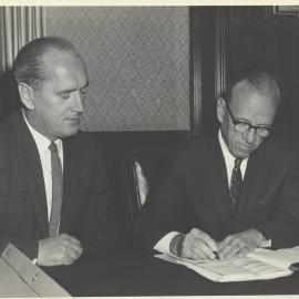 Melbourne Project - Coombs signing construction contract, with WM Leavey looking on - December 1961-September 1966
