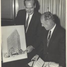 Melbourne Project - Mr Leavey and Governor Coombs with an artist's impression of the proposed new Melbourne Branch building - December 1961-September 1966