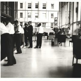 Bank's Functions, etc. - Note Issue - Decimal Currency Conversion - Interior of Head Office banking chamber on changeover day being filmed by ABC cameramen - 14 February 1966
