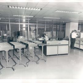 The Bank at Work - Head Office 65 Martin Place - Electronic Data Processing (EDP) Section - John O'Callaghan (seated at console) and Ron Wheeler loading a magnetic tape unit into the new computer - c.1968