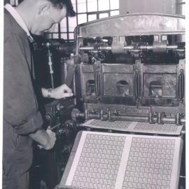 The Bank at Work - Note Printing Branch - Mr Bill Harratt operating stamp printing machine - October 1960