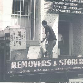 Adelaide Project - 1963-June 1967 - Tea chests of vouchers being loaded onto removalists trucks - 13 April 1966