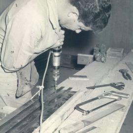 Adelaide Project - 1963-June 1967 - drilling section of metal skirting prior to fixing - 30 April 1965