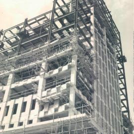 Adelaide Project - 1963-June 1967 - South-east elevation. Exterior brickwork for lift shafts erected to 10th floor level - 14 April 1965