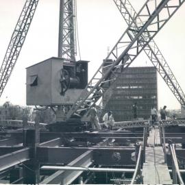 Adelaide Project - 1963-June 1967 - Erecting the "stiff-leg" crane on the steelwork at 2nd floor level - 18 November 1964