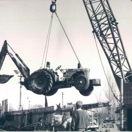 Adelaide Project - 1963-June 1967 - Trench digger being lifted from excavation - 6 August 1964