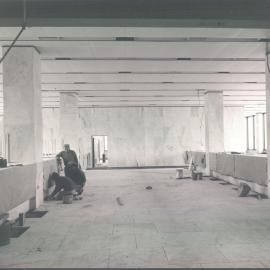 Melbourne Project - December 1961-September 1966 - Masons laying paving slabs in public area, Bonds & Stock Banking Chamber, 2nd floor - 24 May 1966