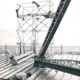 Melbourne Project - December 1961-September 1966 - view from roof top of men dismantling builders skip - 9 March 1966
