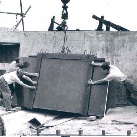 Melbourne Project - December 1961-September 1966 - Reconstructed granite being swung into position on northern face (16th floor level) - 19 November 1965