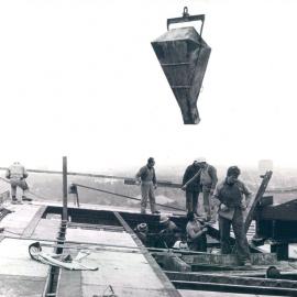 Melbourne Project - December 1961-September 1966 - Concrete being lowered into position - southern end of roof - 13 July 1965