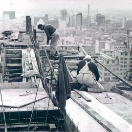 Melbourne Project - December 1961-September 1966 - Workers on north western corner of roof - 13 July 1965