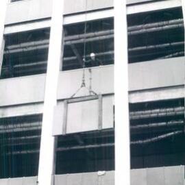 Melbourne Project - December 1961-September 1966 - Lifting granite spandrel up the western face of building -  20 May 1965