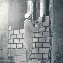 Melbourne Project - December 1961-September 1966 - Bricking up of air-conditioning riser duct (west perimeter zone) at 2nd floor level - 19 March 1965
