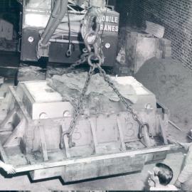 Melbourne Project - December 1961-September 1966 - 16" door being lowered to ramp after lift from semi-trailer - 30 May 1964