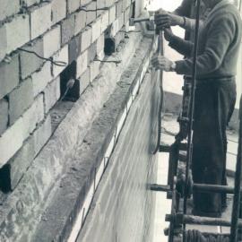 Head Office Building - January 1963-January 1965 - Re-laying glazed bricks around service core, 10th floor level - 9 October 1963