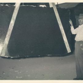 Head Office Building - January 1963-January 1965 - Mr Martin, Managing Director of suppliers, inspecting finished slab of granite - 2 January 1963