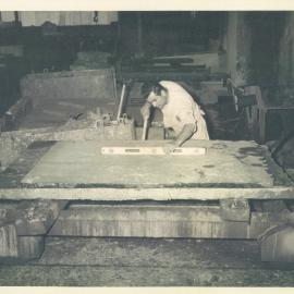 Head Office Building - January 1963-January 1965 - Processor testing slab of raw granite for suitability for processing - 2 January 1963