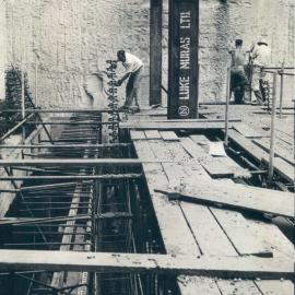 New Head Office Building - June 1960-January 1963 - Tangbar reinforcement being inserted in strongroom wall, No. 1strongroom, 3rd basement - 14 December 1961