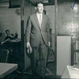 Staff - Individual Officers - MJ (John) Phillips - Walking into office -  1961