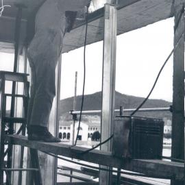 Premises - Branches - Canberra - RBA - Welding lugs to windows first floor - August 1964