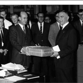 Staff - Social Functions - Head Office - Mitch Greenlaw Retires - Stuart Done presents Mitch with a farewell  gift - 26 June 1969