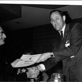 Charles Jordine, receiving an award for “Currency” - 1969