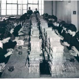 Note Issue Branch, Fitzroy - Counting cancelled notes in Burn Count Room, prior to burning - c.1958